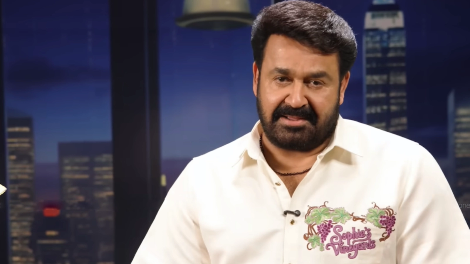 Mohanlal hosting Bigg Boss Malayalam Season 7 studio set.